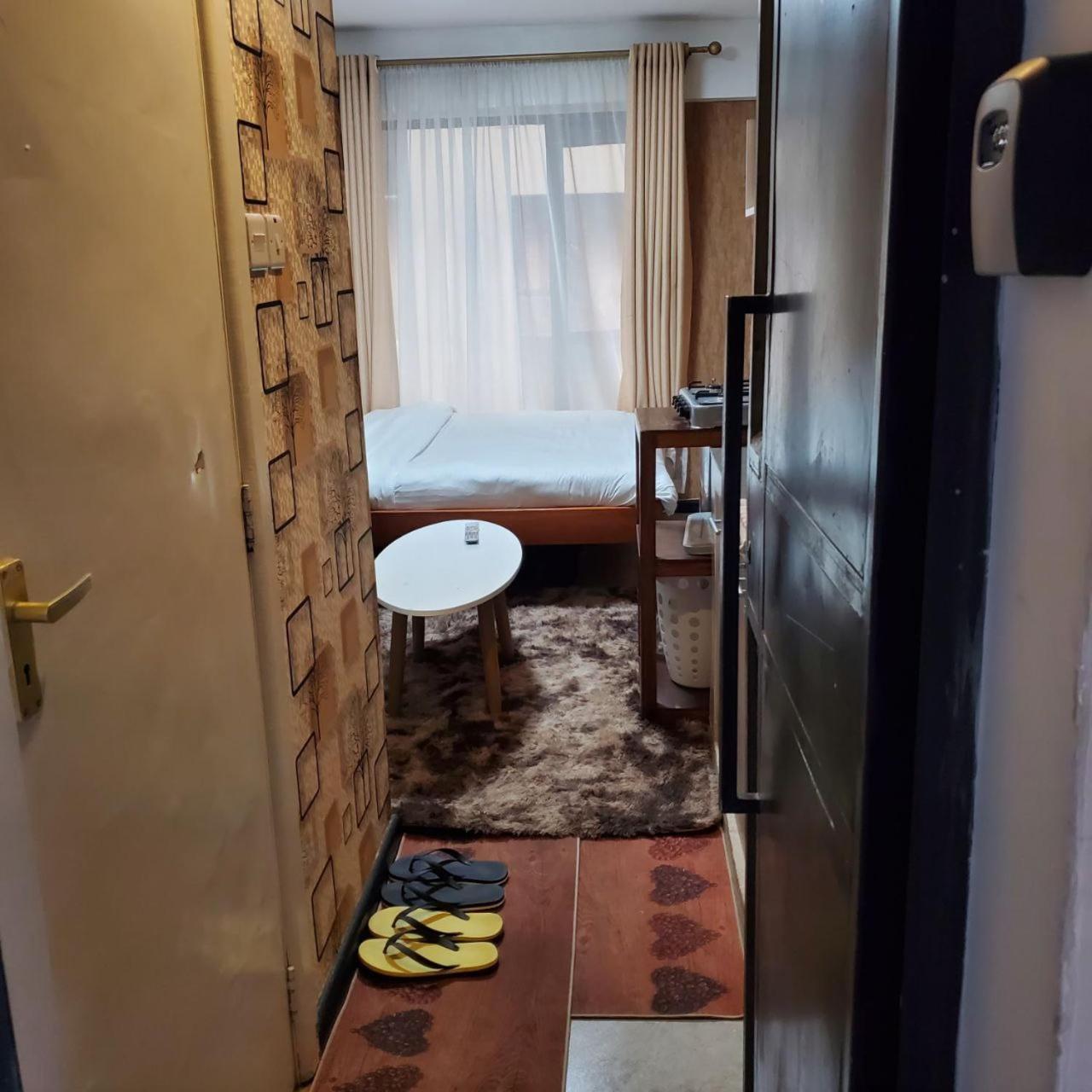 Lovely & Cozy Compact Studio Near Airport With Rooftop View Apartment ไนโรบี ภายนอก รูปภาพ